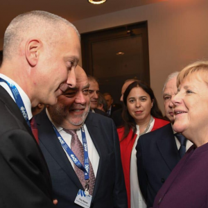 Boris Lozhkin with Angela Merkel